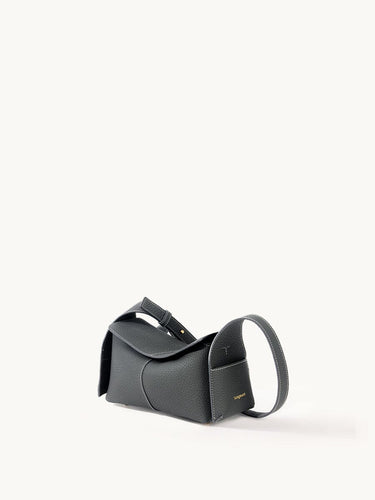 Mini Drippy Roof Bag in Stardust pebbled leather, structured rectangular shape with flap closure and top handle.