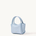 Light blue pebbled leather Mini Song Bag with rounded handles and gold feet