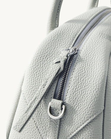 Mini Yore Bowling Bag in Celeste grey full-grain leather with silver zipper detail.