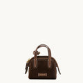 Mini Yore Bowling Case in Chestnut Suede with leather handles and white stitching. Features embossed Songmont logo.