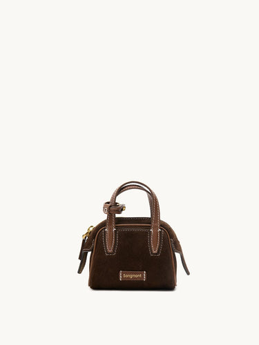 Mini Yore Bowling Case in Chestnut Suede with leather handles and white stitching. Features embossed Songmont logo.