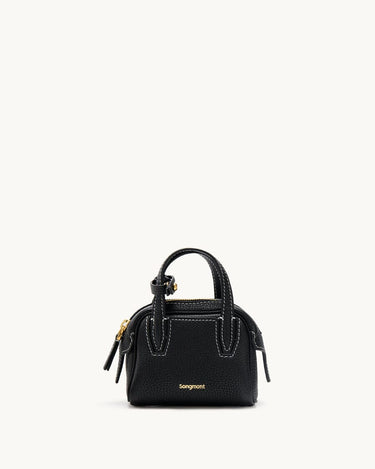 Mini Yore black full-grain leather bowling case with white stitching and gold hardware.