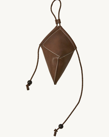 Brown leather Prism Airpods Case with white stitching and braided strap