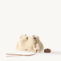 Shearling Gather Clutch Set in amber featuring plush shearling and leather details, with a rolled strap.