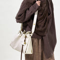Small Gather Bag Set in Cloud color, crafted from Nappa leather with a soft, slouchy silhouette and adjustable straps.
