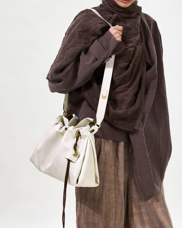 Small Gather Bag Set in Cloud color, crafted from Nappa leather with a soft, slouchy silhouette and adjustable straps.