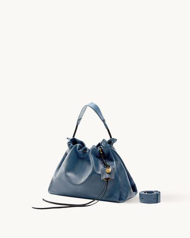 Navy Small Gather Bag Set with drawstring, leather strap, and gold charm.