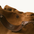 Small Gather Bag Set in Ochre Suede, featuring cow suede leather and dark brown leather strap with braided detail.