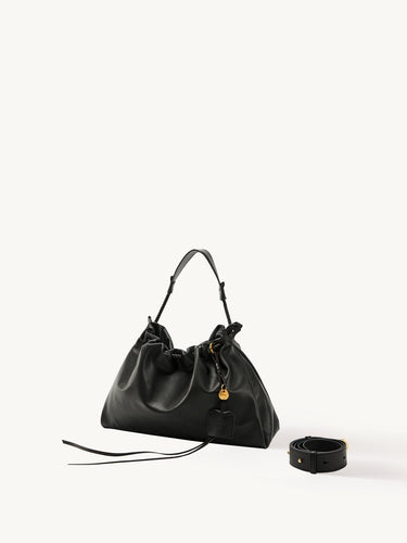 Black leather Small Gather Bag Set with braided handle and adjustable strap.