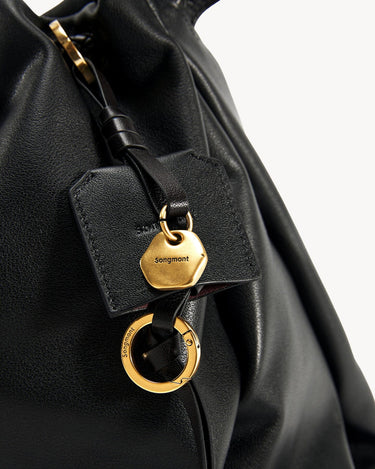 Black leather Small Gather Bag Set with gold hardware and Songmont logo tag.