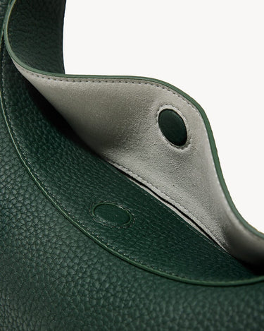 Emerald Small Luna Bag interior detail with textured leather and snap closure