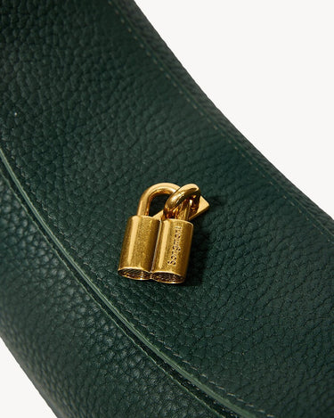 Small Luna Bag in emerald green textured leather with gold Songmont lock hardware.