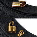 Small Luna Bag in Onyx featuring a gold-tone clasp with embossed Songmont logo.