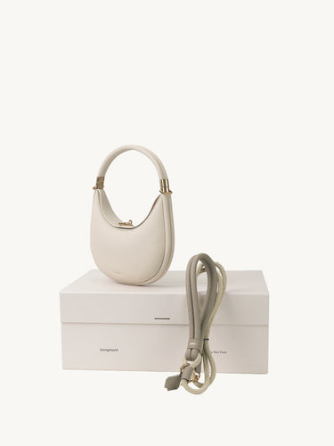 Ivory Luna bag and cream apricot leash on Songmont box