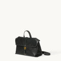 Black Small Shan Satchel Bag in vegetable-tanned leather with gold buckle and white stitching
