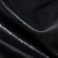 Close-up of black vegetable-tanned leather texture for the Small Shan Satchel Bag.