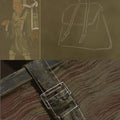 Small Shan Satchel Bag inspiration: monk's satchel and ornate buckle detail.