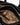 Interior of black Small Yore Duffle Bag with patterned lining and visible compartments.