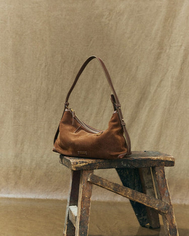 Small Yore Hobo Bag in Sandal Suede, crafted from cow suede leather with vegetable-tanned leather accents.