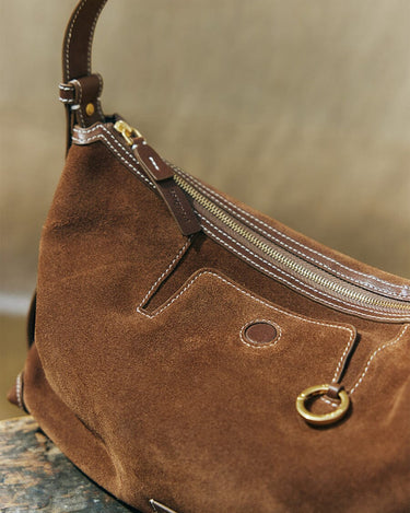 Small Yore Hobo Bag in Sandal Suede, featuring cow suede, detailed stitching, and a zippered compartment.