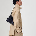 Small Yore Hobo Bag in Onyx, crafted from vegetable-tanned leather with adjustable strap for versatile wear.