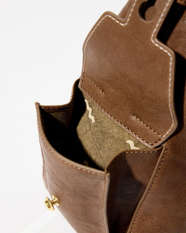 Brown leather Small Yore Hobo Bag interior lining with camouflage pattern and gold hardware detail.