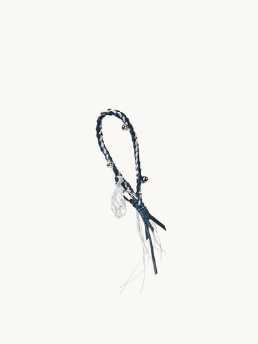Tranquil Crystal Charm with braided cord, silver bells, and leather tassels.