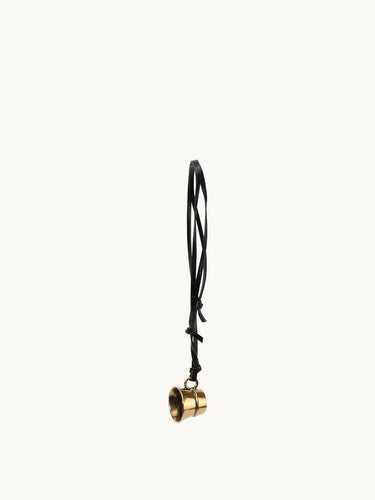Worry-Free Cup Charm: Vegetable-tanned leather cord with gold alloy charm.